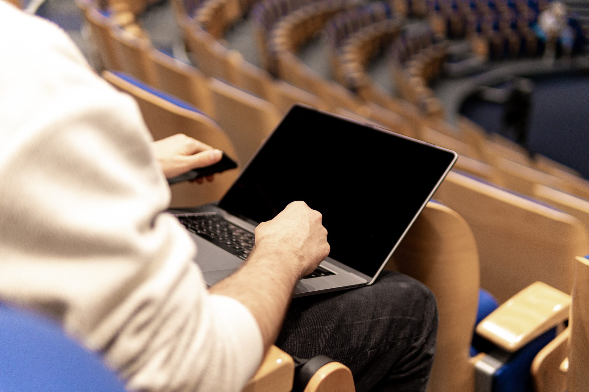 Laptop showing an event website
