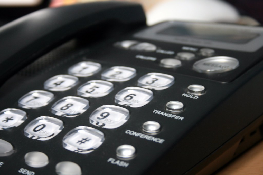 Office desk phones in low light