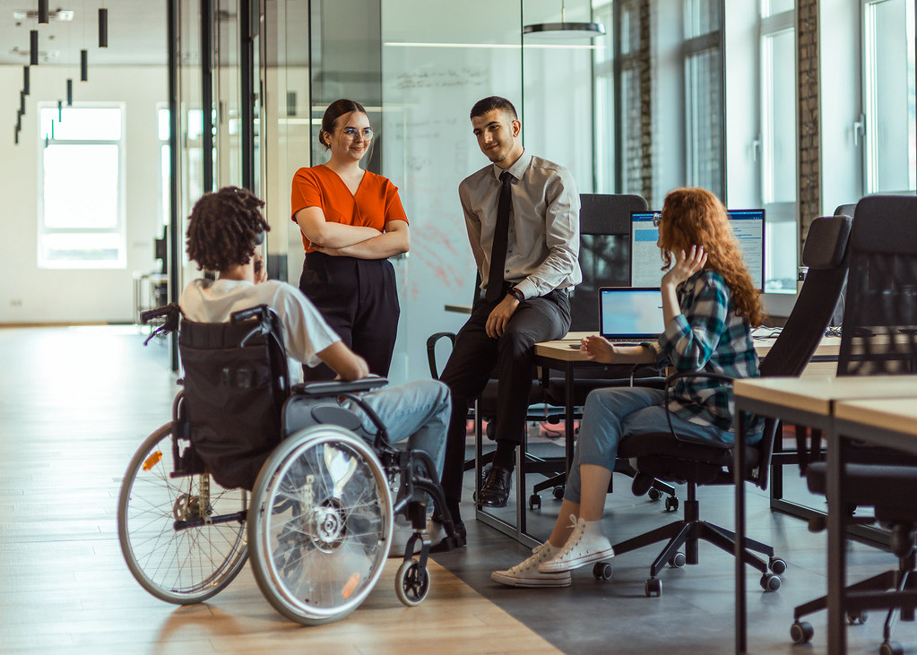 A diverse group collaborating as a team