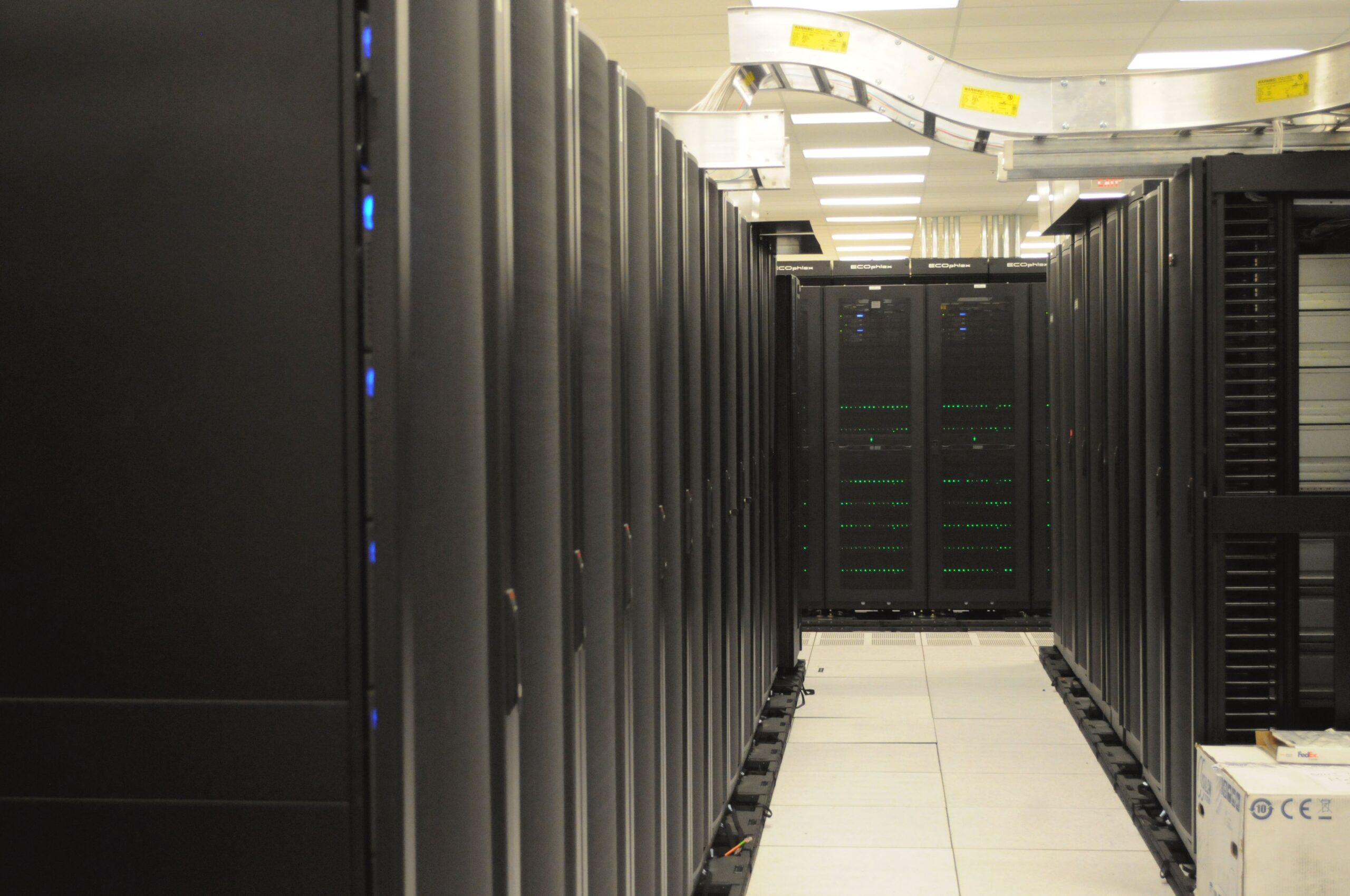 Rows of server racks in a data aisle