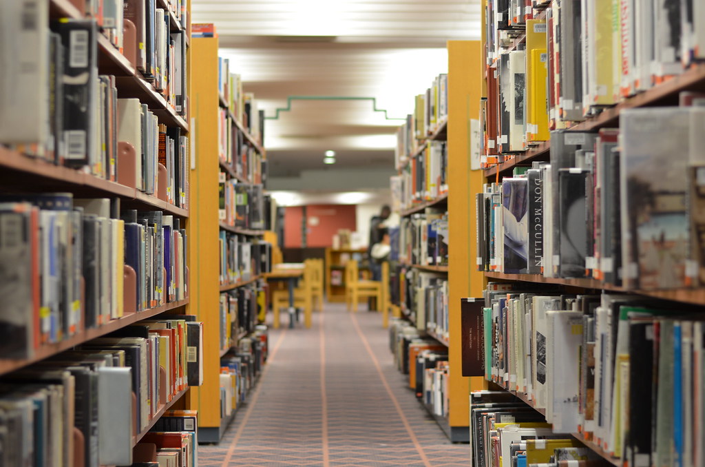 Aisle of library bookshelves