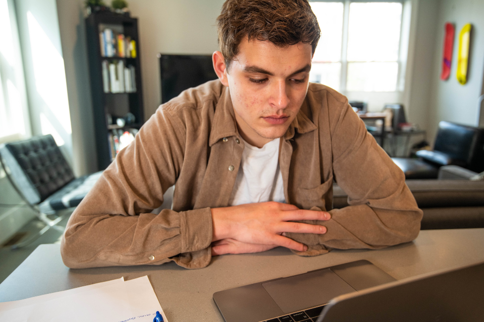 Person comparing options on a laptop