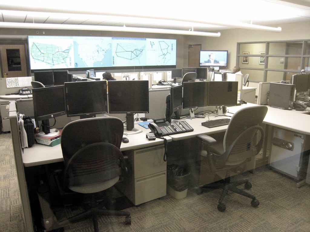 Network operations center with monitors and a video wall