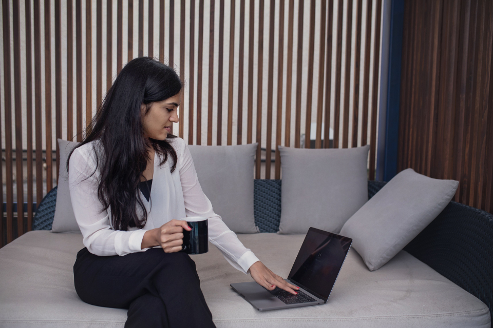 Person using a laptop at a desk