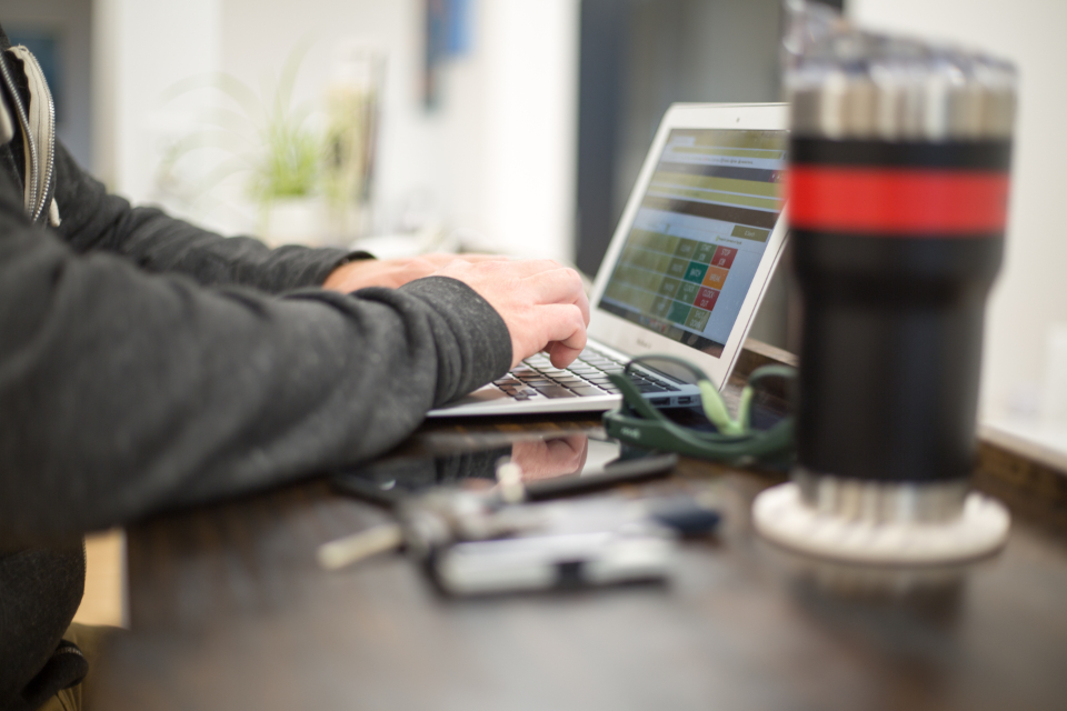 Person using a laptop close-up