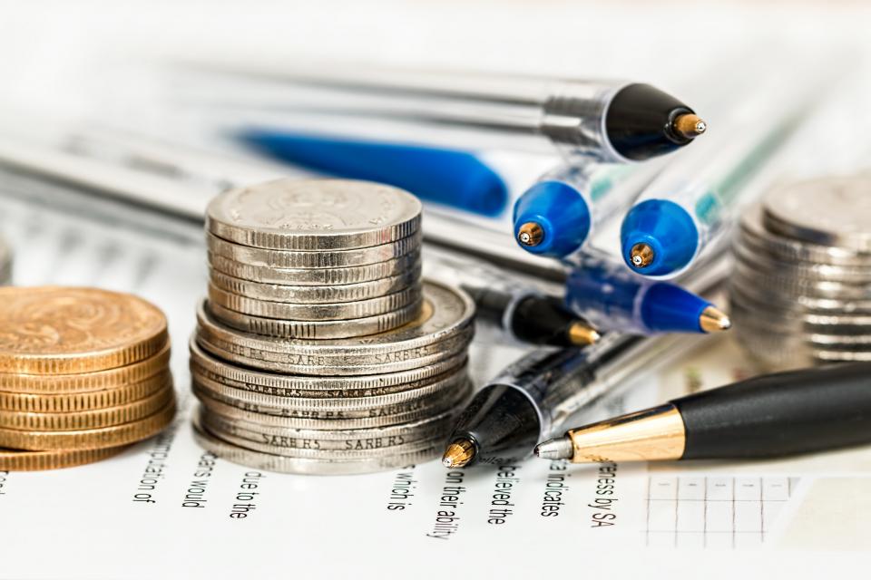 Stacked coins representing cost savings