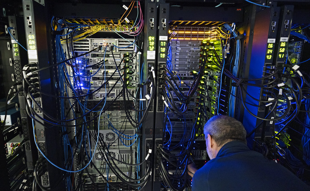 Engineer working on a server rack