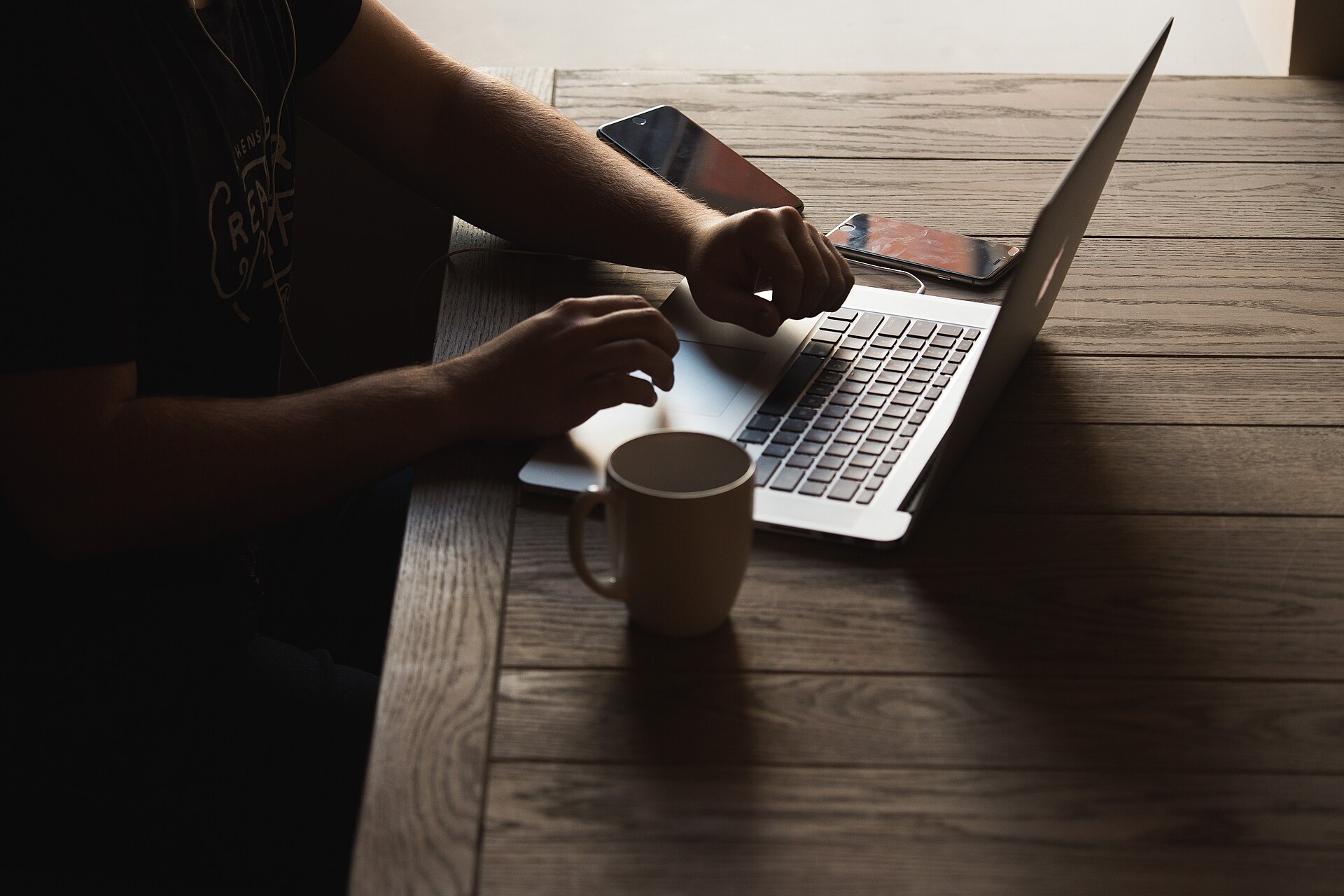 Mobile developer working on a laptop