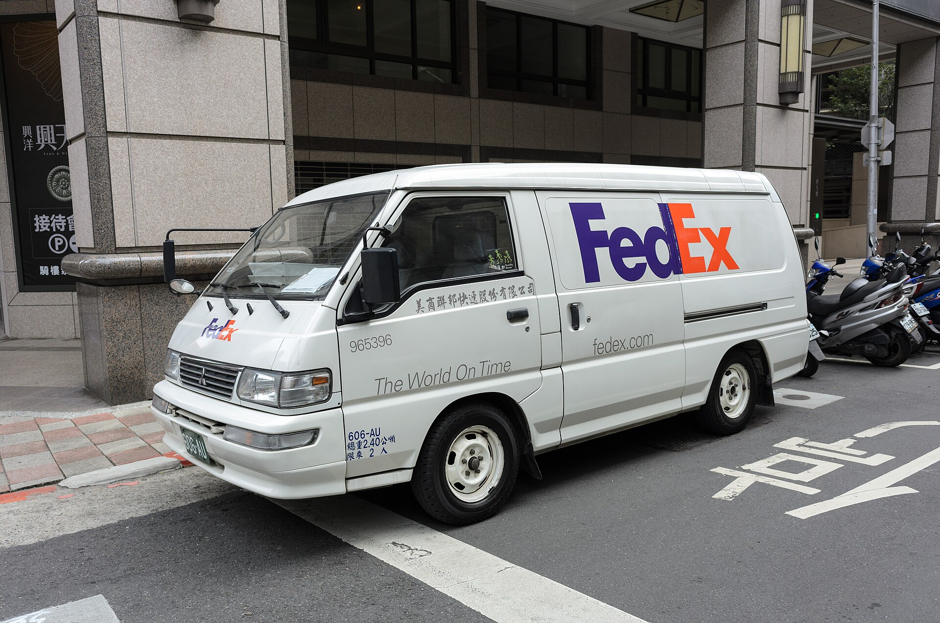 Delivery van parked on a street