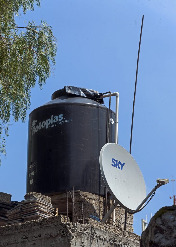 Tinaco and satellite dish in Mexico City