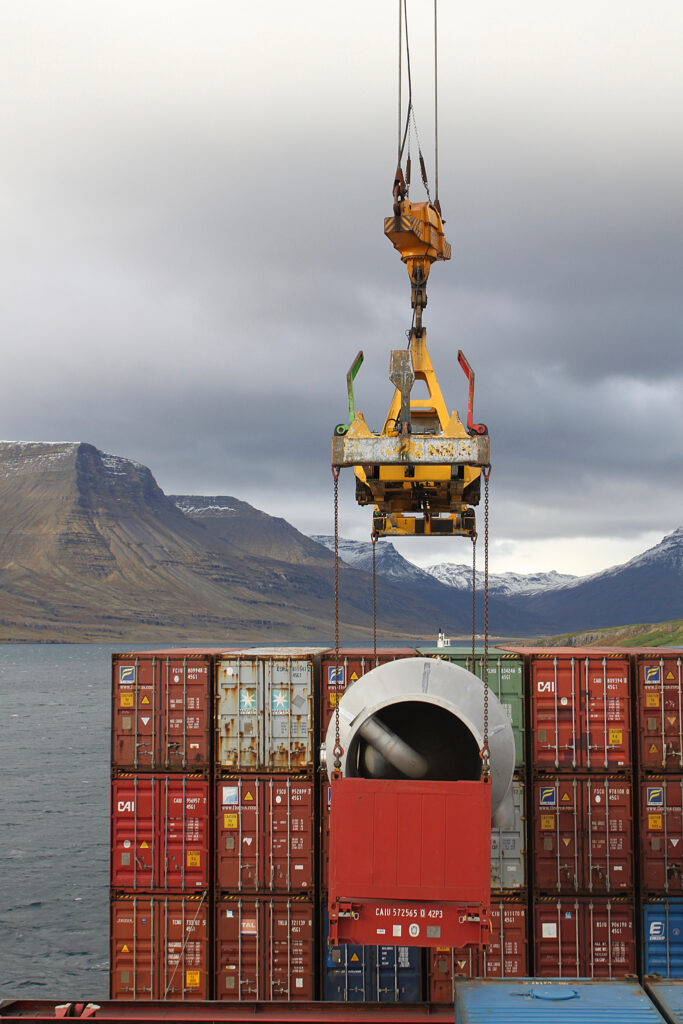 Cargo container ship being loaded at port