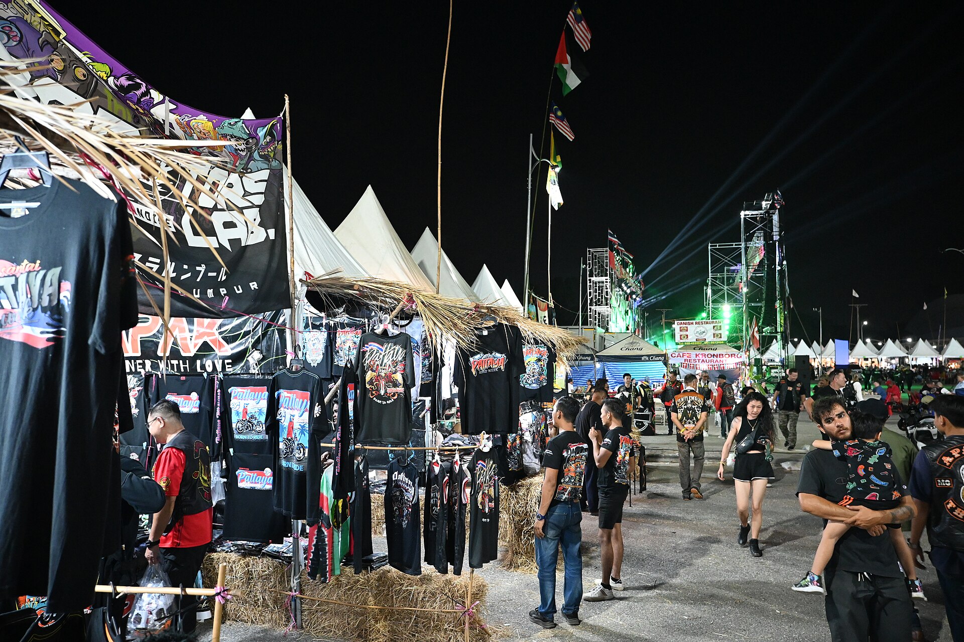 Printed t-shirts on a rack at a market stall