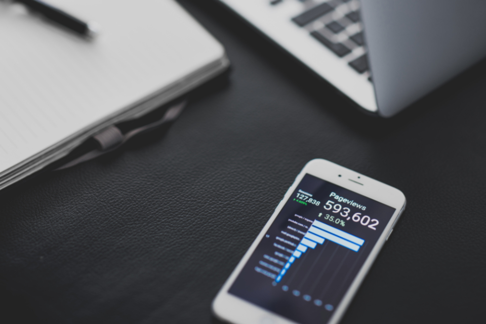Reviewing analytics metrics at a desk