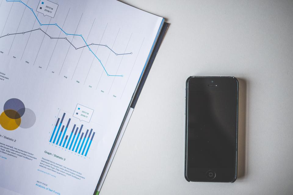 Open printed report showing charts