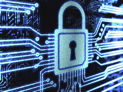 A padlock over a circuit-board background
