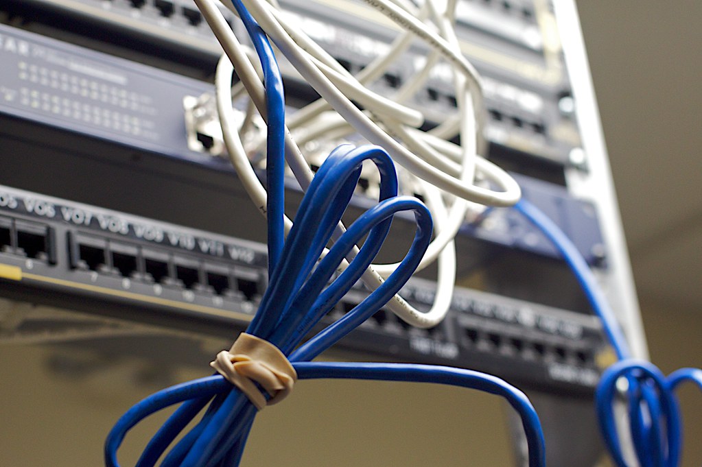 A tidy network patch panel with bundled cabling