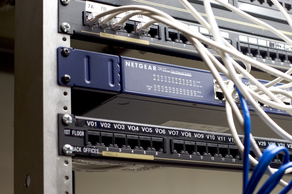Network switch and patch cabling in an equipment rack